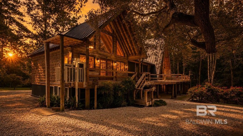 Tucked away on approximately 5 private, high-and-dry acres along - photo 4