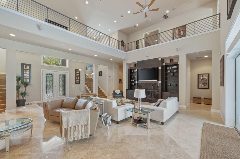 Experience refined coastal luxury in this exceptional 4-bedroom - photo 4