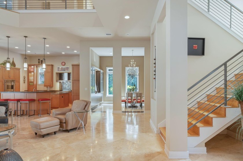 Experience refined coastal luxury in this exceptional 4-bedroom - photo 8