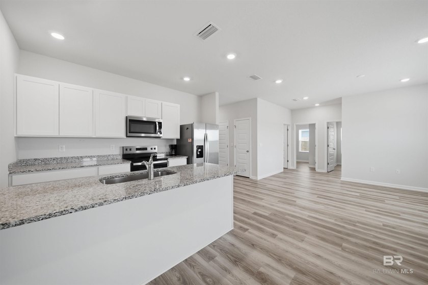 Like-new construction for LESS in Foley's highly sought-after - photo 3
