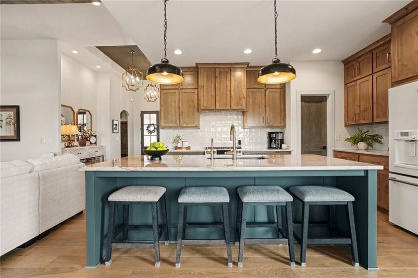 A stunning reverse ranch loaded with custom upgrades. Step - photo 13