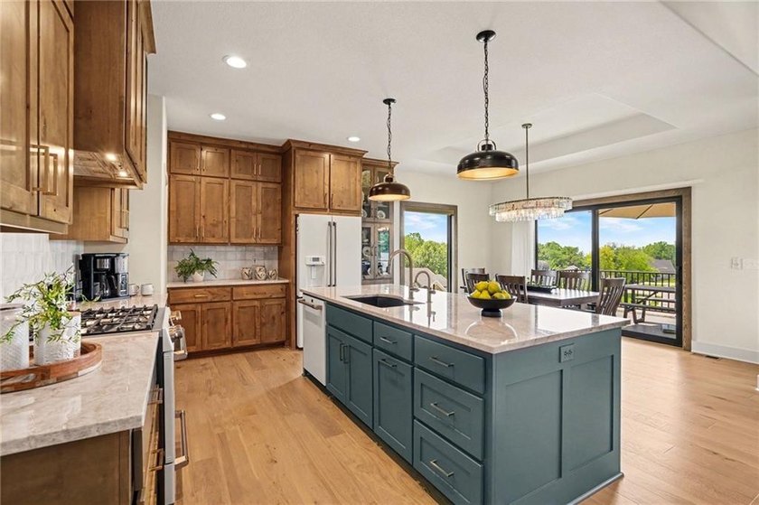 A stunning reverse ranch loaded with custom upgrades. Step - photo 14