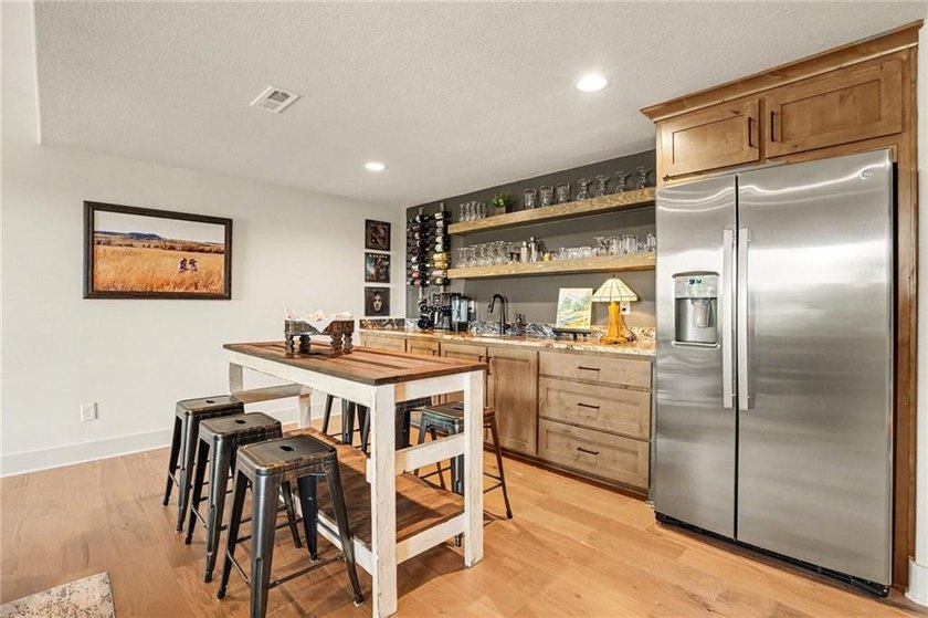 A stunning reverse ranch loaded with custom upgrades. Step - photo 23