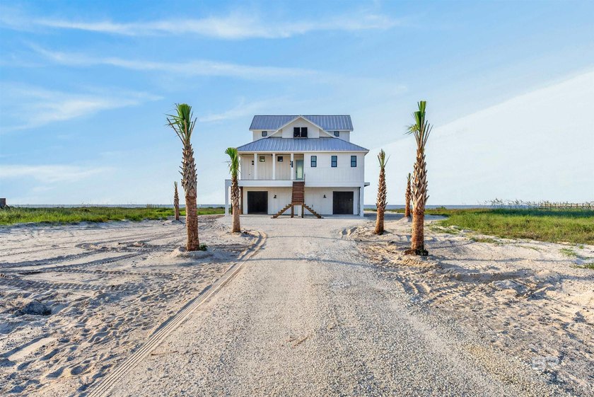 Now complete and move-in ready! This Gold Fortified waterfront - photo 2