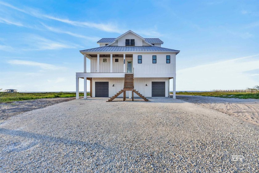 Now complete and move-in ready! This Gold Fortified waterfront - photo 3