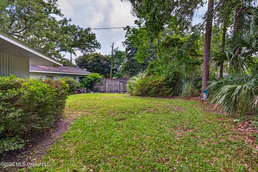 Welcome to this charming 1950's gem nestled in the heart of - photo 33