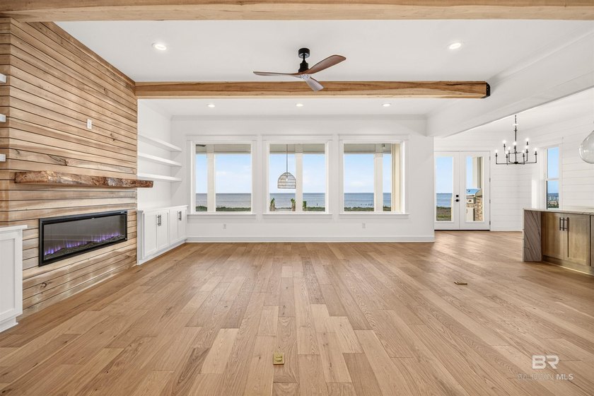 Now complete and move-in ready! This Gold Fortified waterfront - photo 4