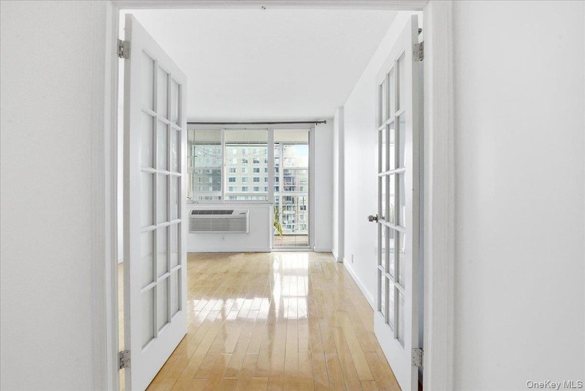 Sun-Filled 1-Bedroom + Office Corner Unit in Forest Hills Bright - photo 12