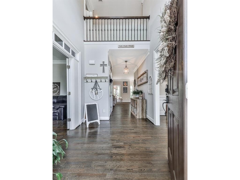 Welcome to this stately 5-bedroom, 4-bath home situated on a - photo 4
