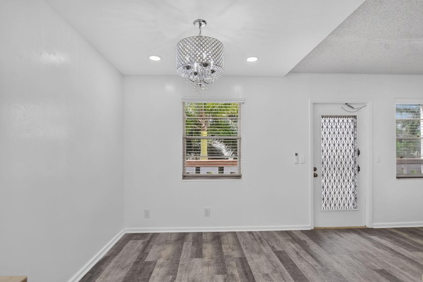 Welcome home! This freshly renovated, 3rd-floor 2-bed, 1.5-bath - photo 11