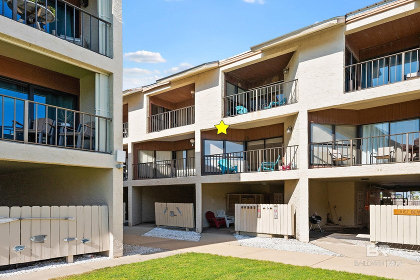 Located in a low-density complex just steps from the best of - photo 3