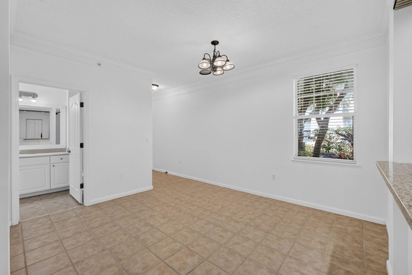Rare Ground-Floor End Unit w/One-Car Garage In The Heart Of - photo 25