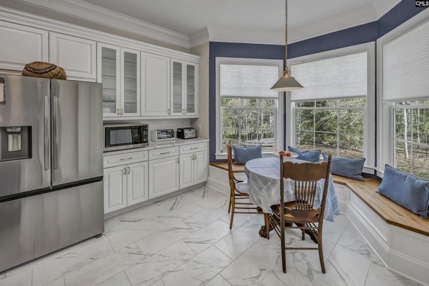 Modern comfort meets relaxed lake living on this spacious 1-acre - photo 26