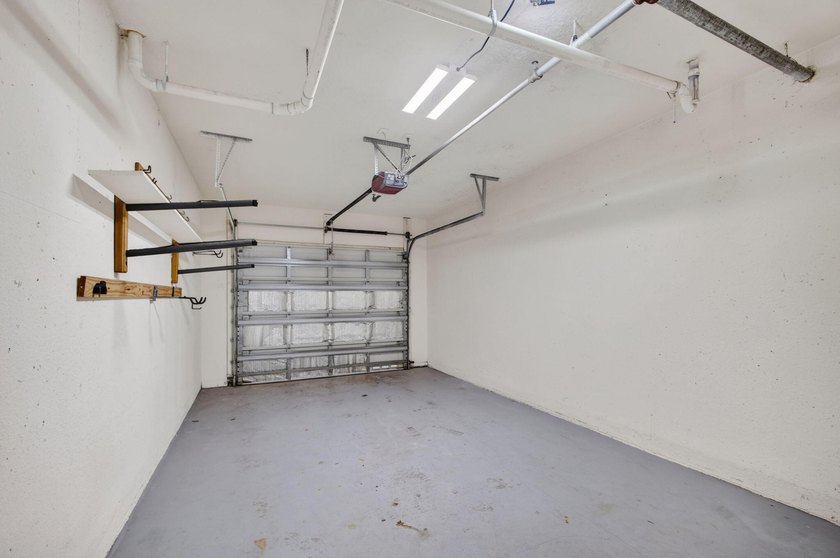 Rare Ground-Floor End Unit w/One-Car Garage In The Heart Of - photo 30