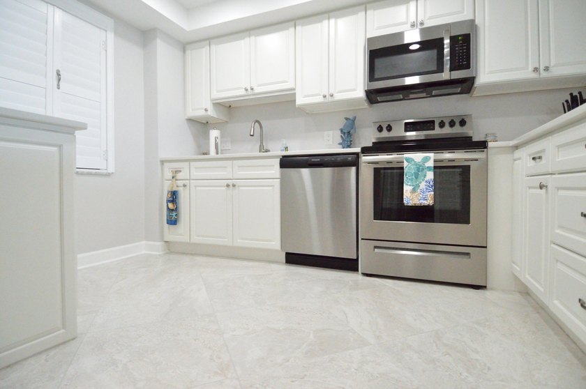 Enjoy waterfront living in this beautifully updated 2-bedroom - photo 12