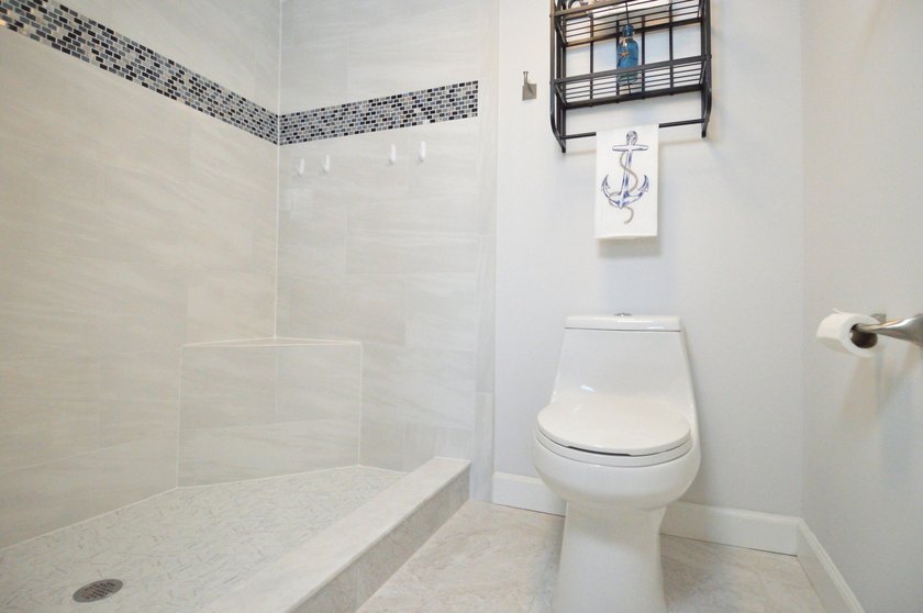 Enjoy waterfront living in this beautifully updated 2-bedroom - photo 25