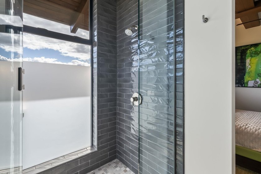 Sunlight and ocean breezes flow through 21 feet of bi-folding - photo 33