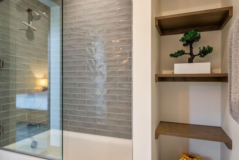 Sunlight and ocean breezes flow through 21 feet of bi-folding - photo 40