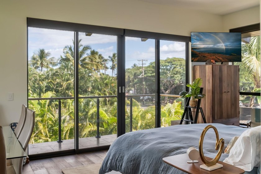 Sunlight and ocean breezes flow through 21 feet of bi-folding - photo 41