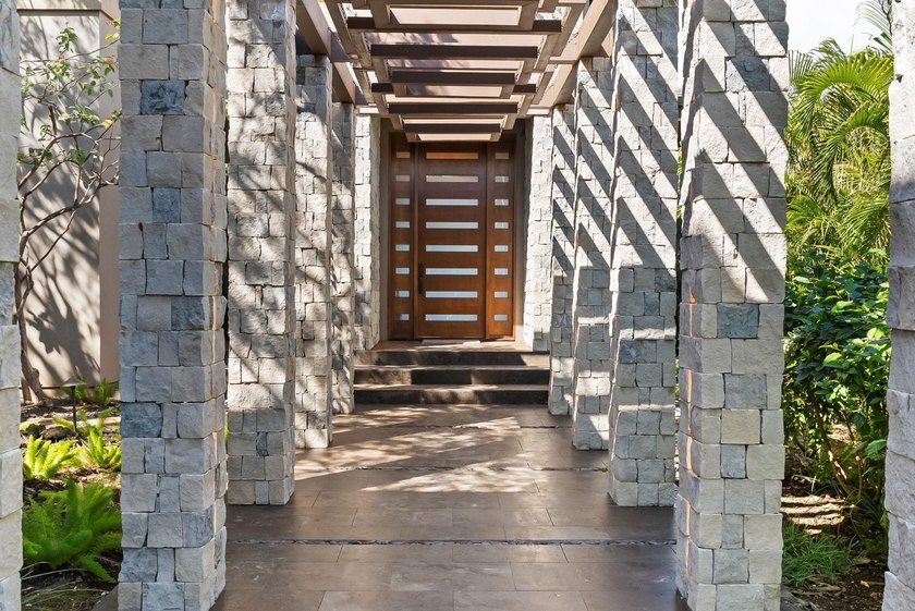 Sunlight and ocean breezes flow through 21 feet of bi-folding - photo 46