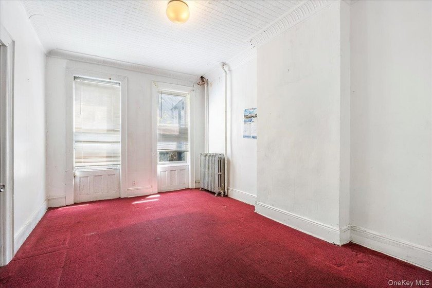 Welcome to this well-maintained 2-family brick home located in - photo 7