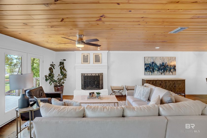 This exquisite bayfront residence features 1.22 acres along the - photo 9