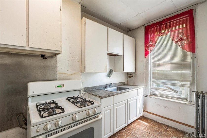 Welcome to this well-maintained 2-family brick home located in - photo 9