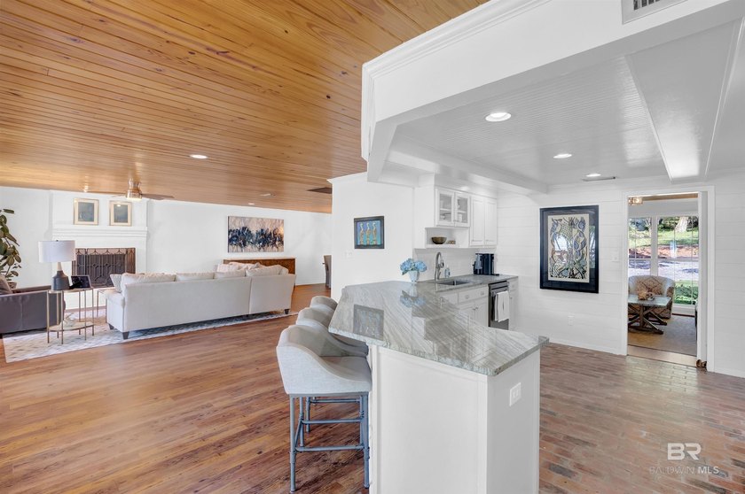 This exquisite bayfront residence features 1.22 acres along the - photo 10