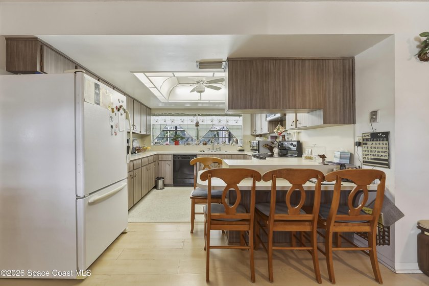 Welcome home to this beautiful 4 bedroom, 2 bath pool home in - photo 11