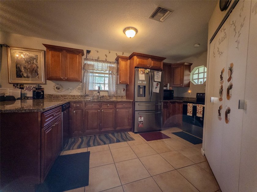 Discover this charming 2-bedroom, 1-bath single-family home - photo 13