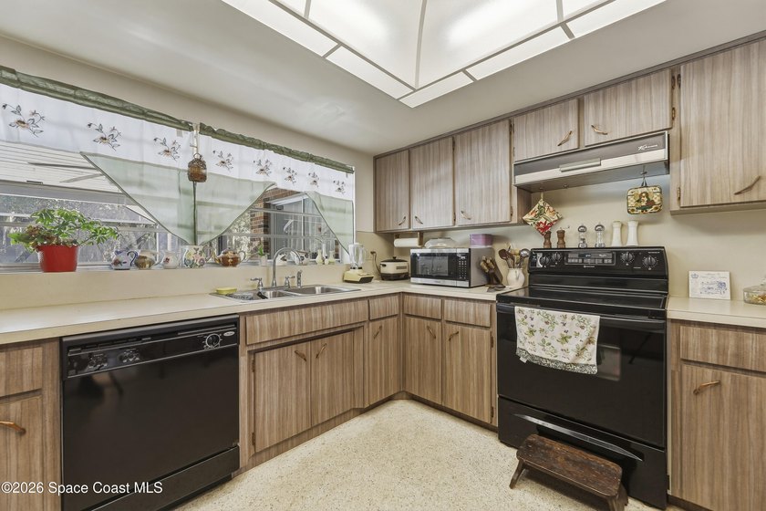 Welcome home to this beautiful 4 bedroom, 2 bath pool home in - photo 14