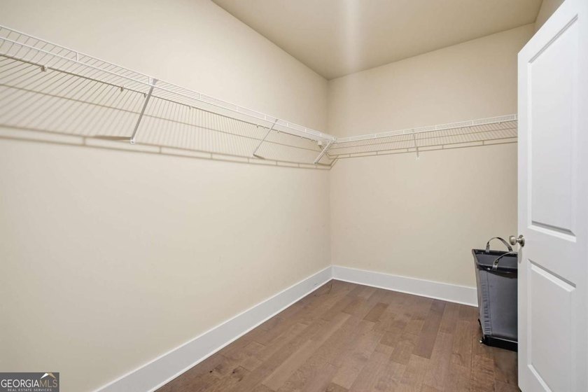 Owner's suite on the main, flexible main-level guest/office - photo 20