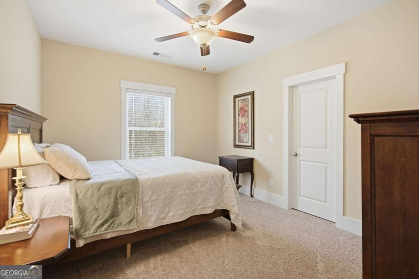 Owner's suite on the main, flexible main-level guest/office - photo 23