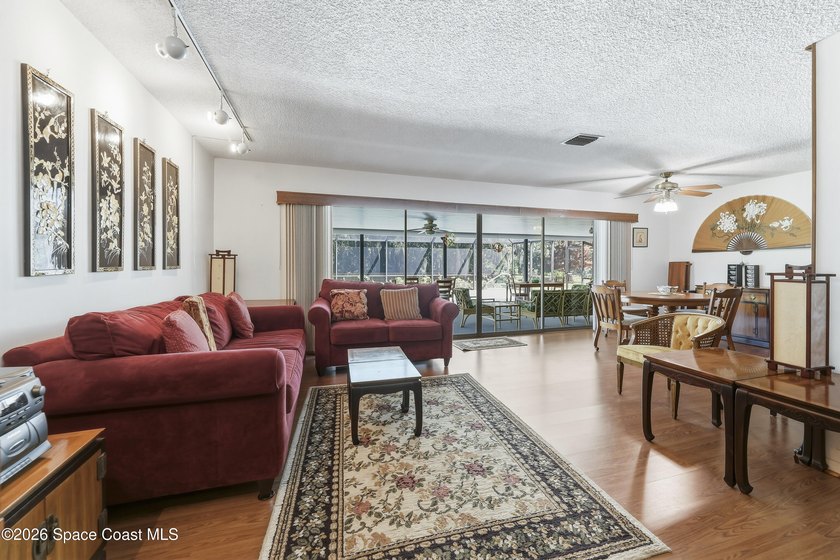 Welcome home to this beautiful 4 bedroom, 2 bath pool home in - photo 24