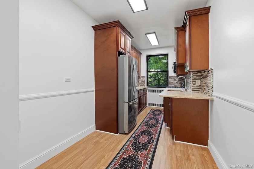 This is a prewar Mid-rise elevator building built in 1914. Unit - photo 9
