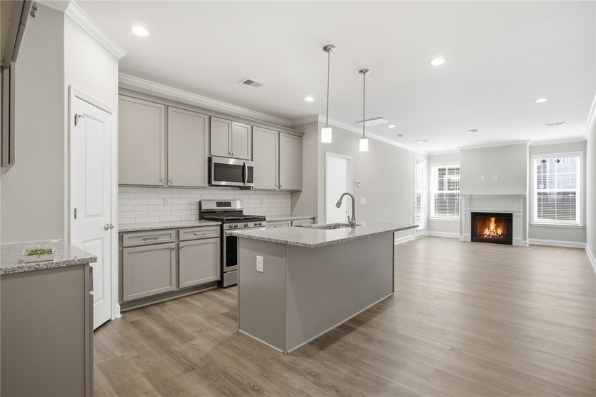 Discover unparalleled convenience and modern elegance in this - photo 6