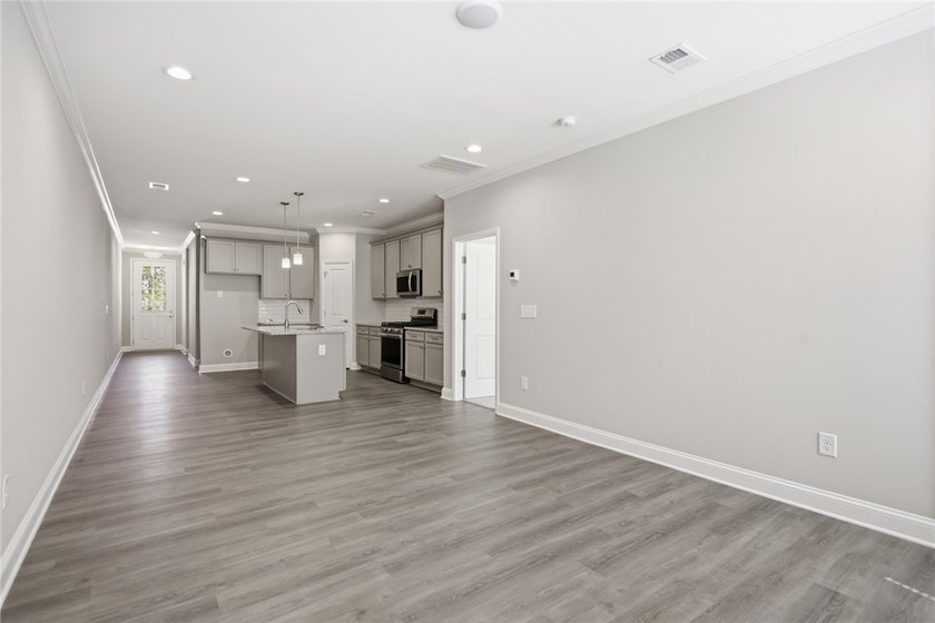 Discover unparalleled convenience and modern elegance in this - photo 9