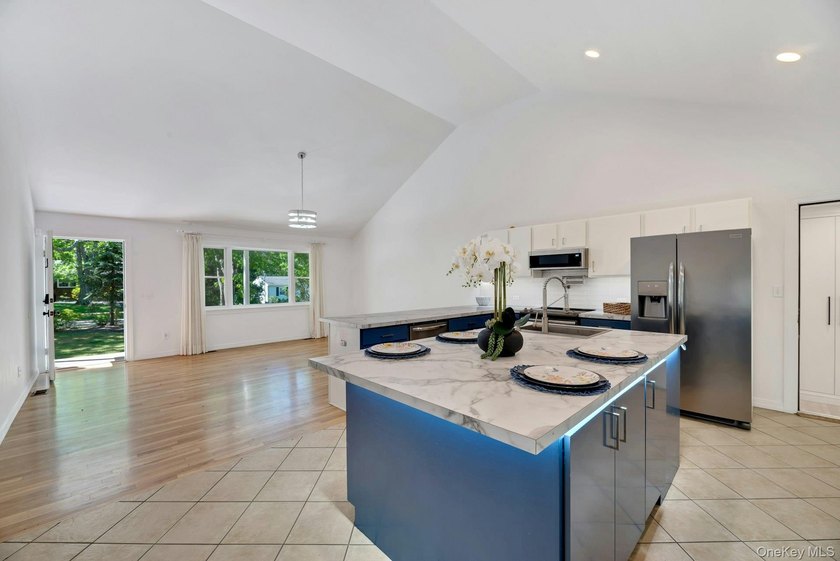 Nestled in the highly sought-after Tiana Shores enclave of - photo 10