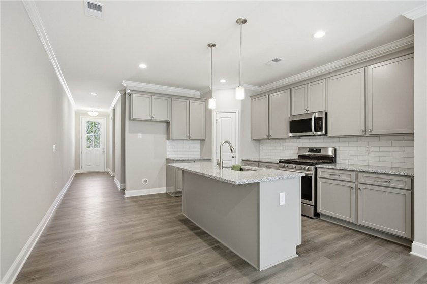 Discover unparalleled convenience and modern elegance in this - photo 10