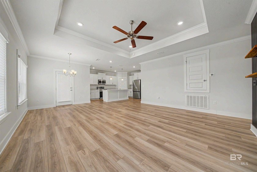 Welcome home! This like-new 4BR/2BA Gold Fortified brick home in - photo 6