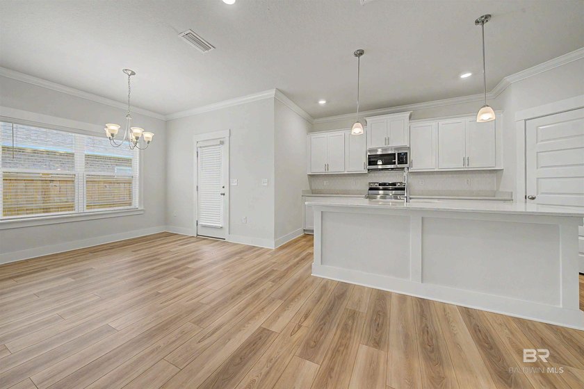 Welcome home! This like-new 4BR/2BA Gold Fortified brick home in - photo 7