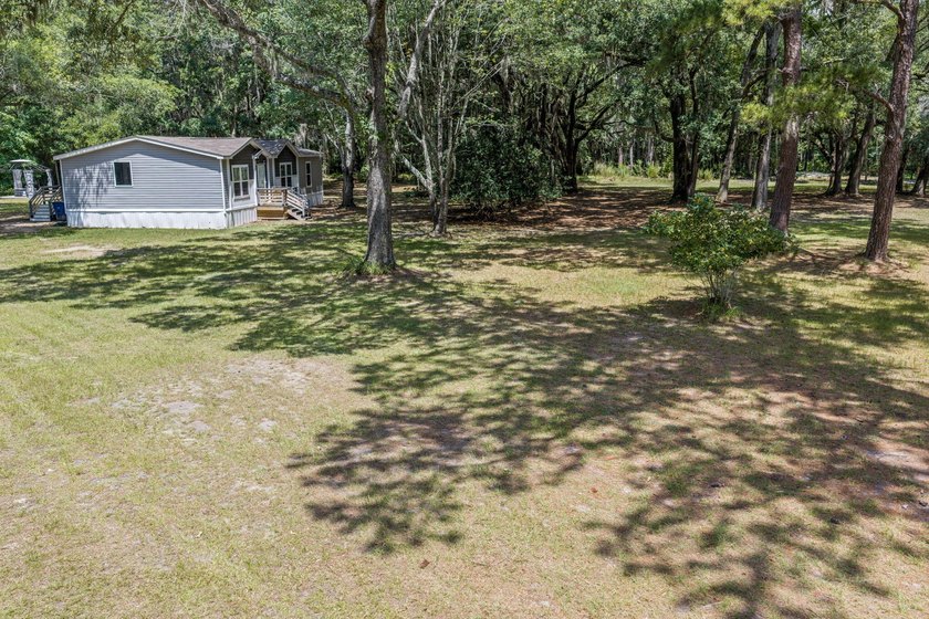 6.19 Acres | Approx. 3-Acre Private Freshwater Lake | 3BR | 2BA - photo 11