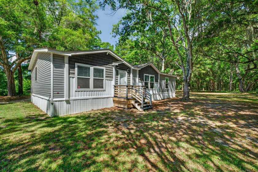 6.19 Acres | Approx. 3-Acre Private Freshwater Lake | 3BR | 2BA - photo 12