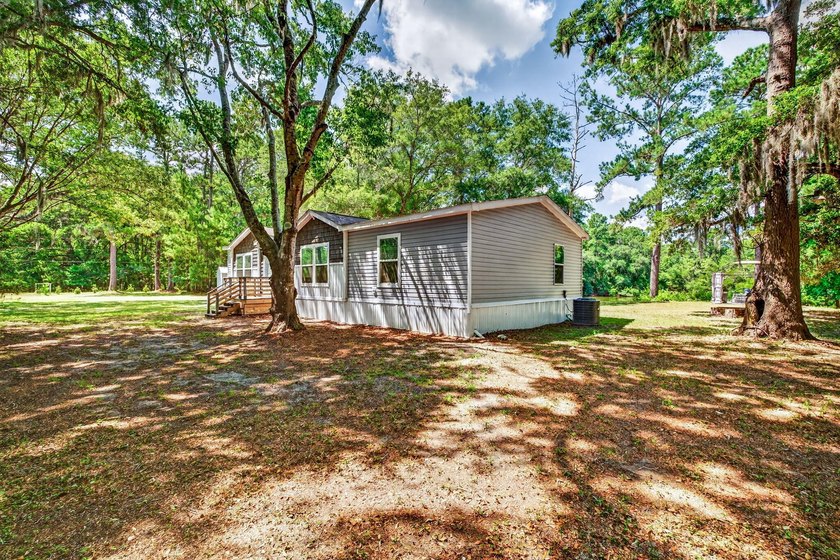 6.19 Acres | Approx. 3-Acre Private Freshwater Lake | 3BR | 2BA - photo 14