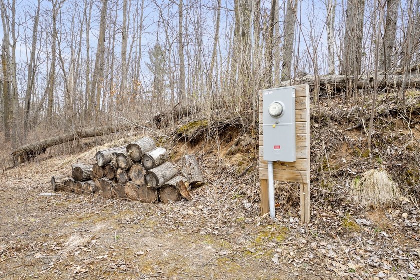 Experience a premier 2.9-acre wooded waterfront lot on Clam - photo 21