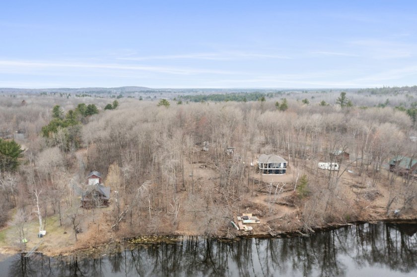 Experience a premier 2.9-acre wooded waterfront lot on Clam - photo 24