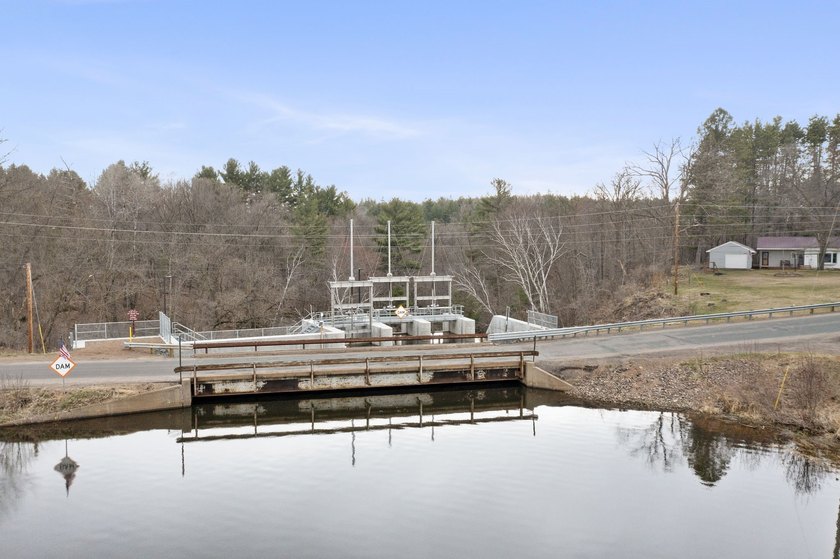 Experience a premier 2.9-acre wooded waterfront lot on Clam - photo 32