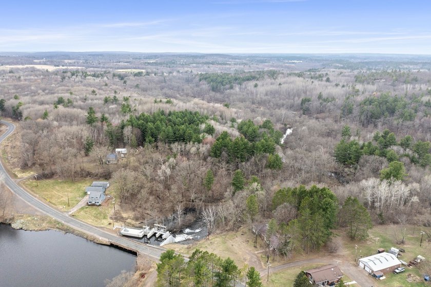 Experience a premier 2.9-acre wooded waterfront lot on Clam - photo 34