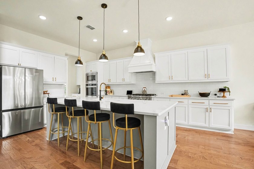 Luxury living meets lakeside community in this stunning - photo 11