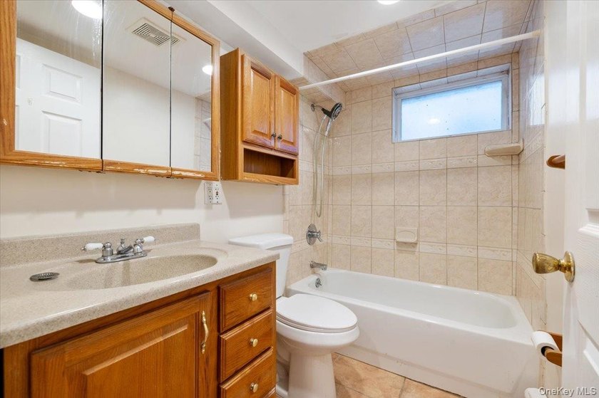 Expanded and rear-dormered Cape featuring 5 spacious bedrooms, 3 - photo 6